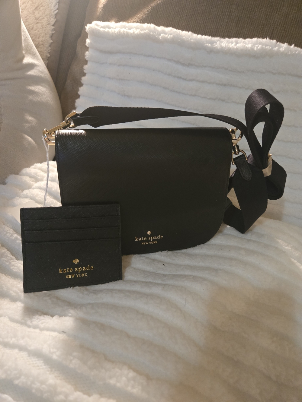 kate spade black leather crossbody with gold hardware and card holder